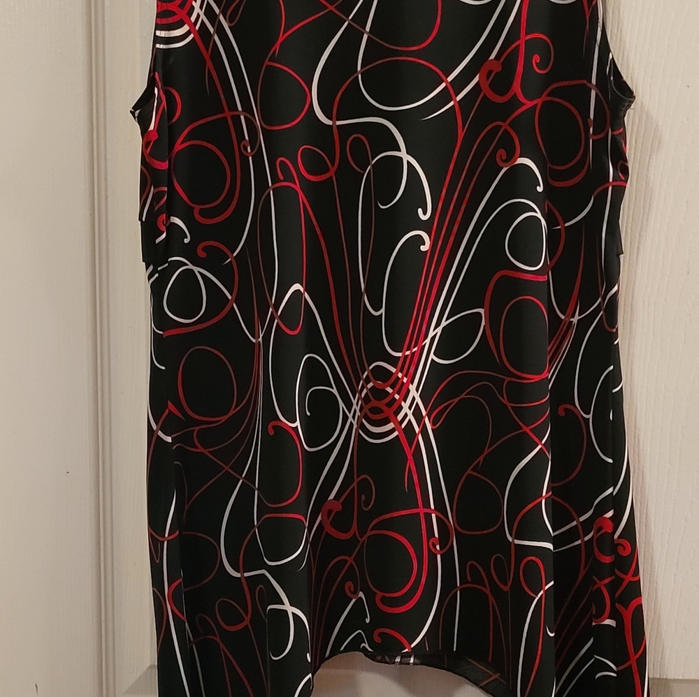 Women nearly new a symmetrical blouse